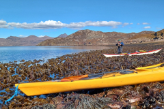 Easter Meet. Kayaking with Gary Bunting across mouth of Little Loch Broom to Scoraig