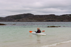 July-–-Sue-Whittle-Kayaking-in-Achmelvich-Bay.-Photo-Whittle-collection